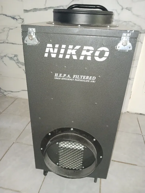 NIKRO HEPA filtered negative air machine used on site